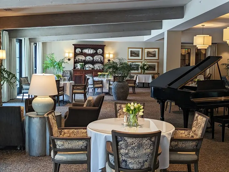 common area with piano and many tables