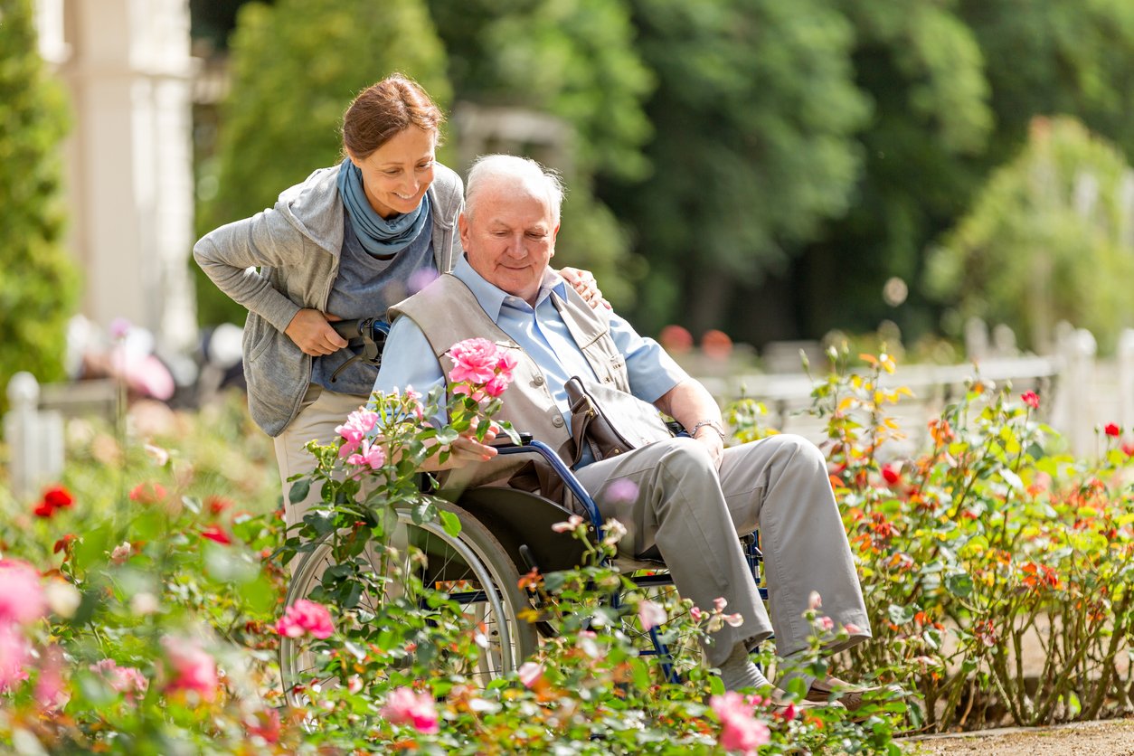 elderly man and woman enjoying assisted living